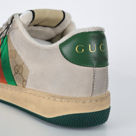 Gucci Screener Low-Top Sneakers – Distressed GG Supreme Canvas with Green Leather Trim