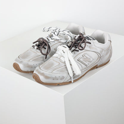Miu Miu x New Balance 2002R Retro Sneakers in White