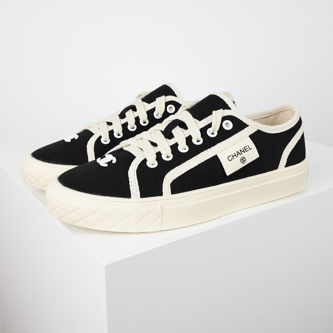 Chanel Limited Edition Low-Top Canvas Sneakers – Black & White with CC Logo Patch