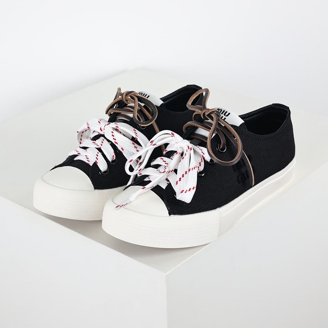 Miu Miu Canvas Low-Top Sneakers in Black