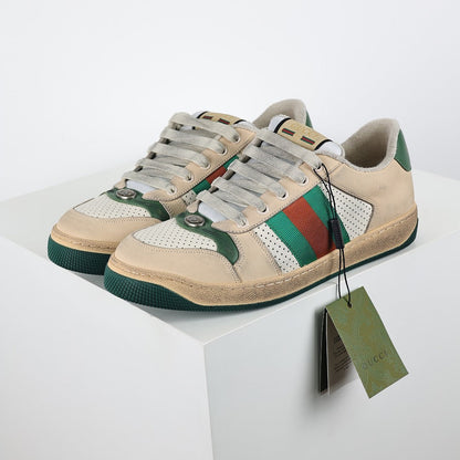 Gucci Screener Low-Top Sneakers – Distressed Leather with Green Trim & Web Stripe