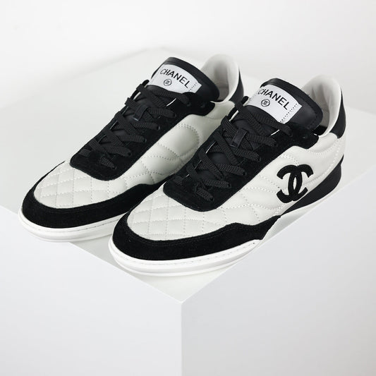 Chanel CC Logo Runner Sneakers – White Quilted Leather & Black Suede