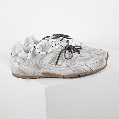 Miu Miu x New Balance 2002R Retro Sneakers in White