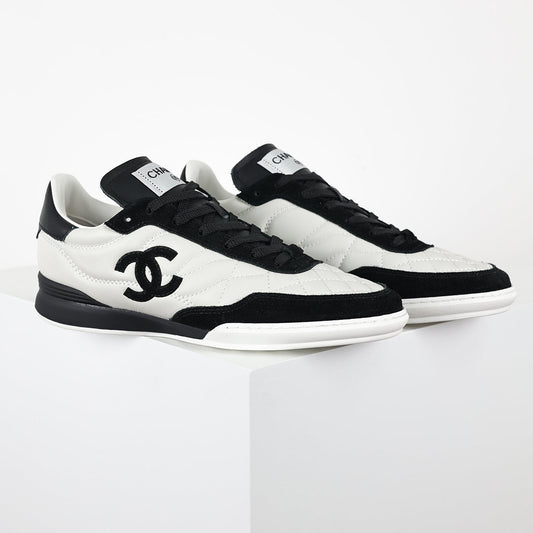 Chanel CC Logo Runner Sneakers – White Quilted Leather & Black Suede