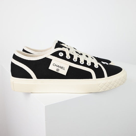 Chanel Limited Edition Low-Top Canvas Sneakers – Black & White with CC Logo Patch