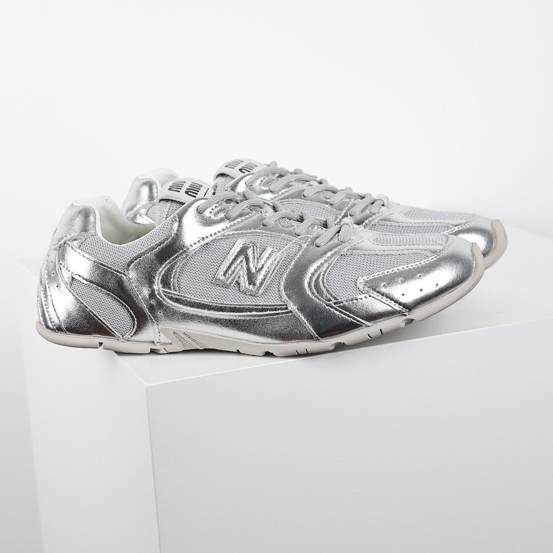 Miu Miu x New Balance NB530 Retro Sneakers in Silver