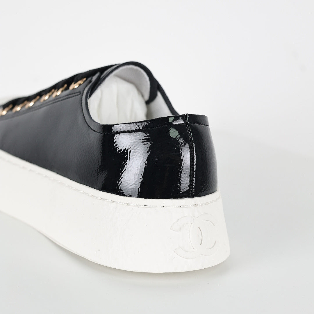 Chanel Low-Top Platform Sneakers – Black Patent Leather with Gold CC Lace Charm