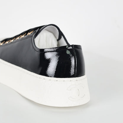 Chanel Low-Top Platform Sneakers – Black Patent Leather with Gold CC Lace Charm