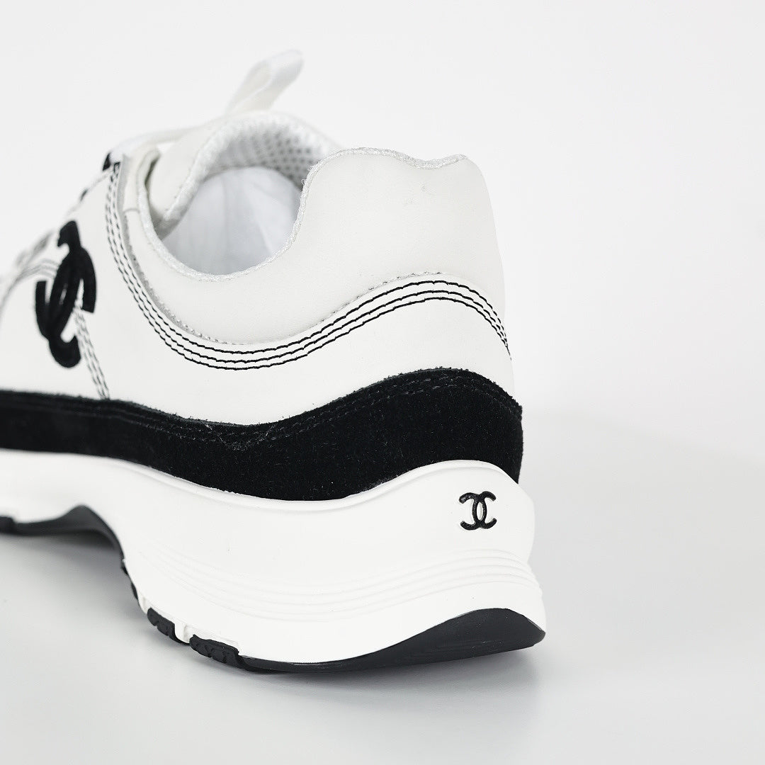 Chanel CC Logo Runner Sneakers – White Leather & Black Suede