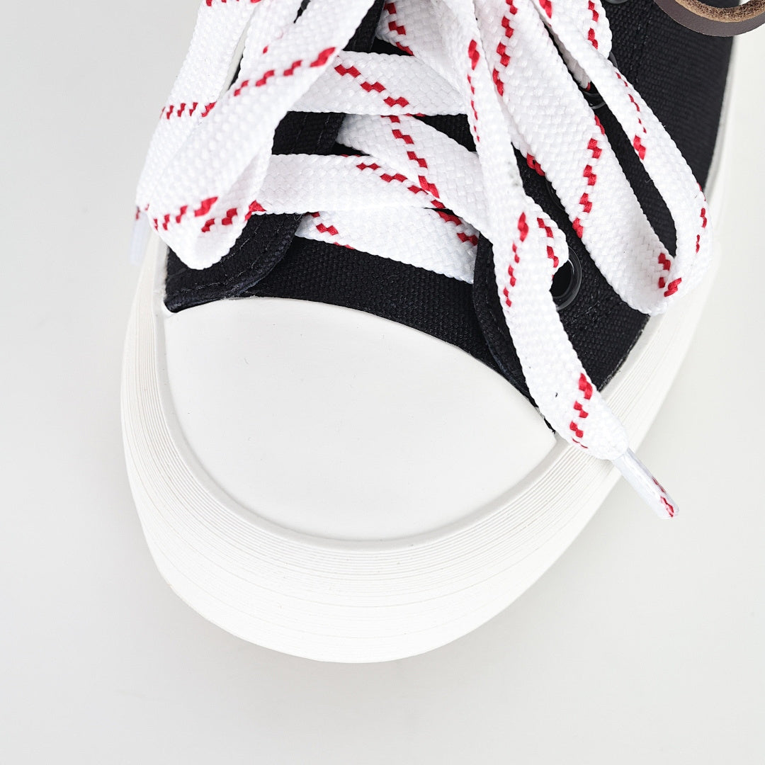 Miu Miu Canvas Low-Top Sneakers in Black