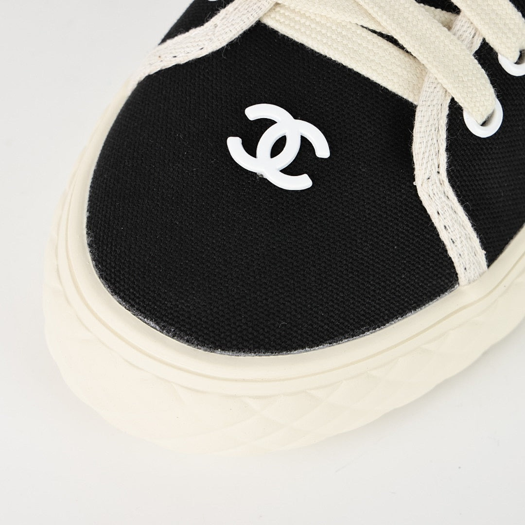 Chanel Limited Edition Low-Top Canvas Sneakers – Black & White with CC Logo Patch