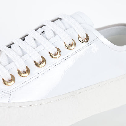 Chanel Low-Top Platform Sneakers – White Leather with Gold CC Lace Charm