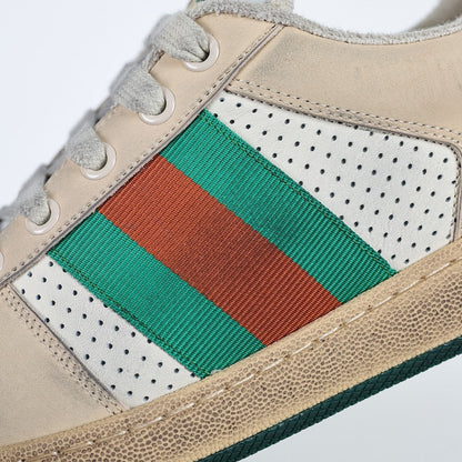 Gucci Screener Low-Top Sneakers – Distressed Leather with Green Trim & Web Stripe