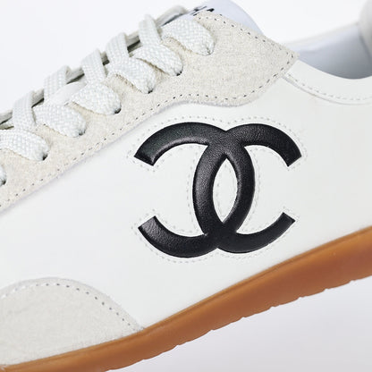 Chanel CC Logo Retro Sport Sneakers – White Leather & Black Suede Toe Cap with Gum Sole