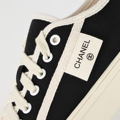 Chanel Limited Edition Low-Top Canvas Sneakers – Black & White with CC Logo Patch