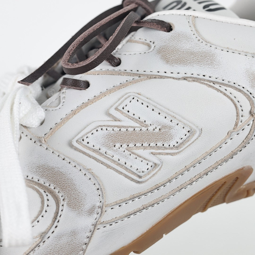 Miu Miu x New Balance 2002R Retro Sneakers in White