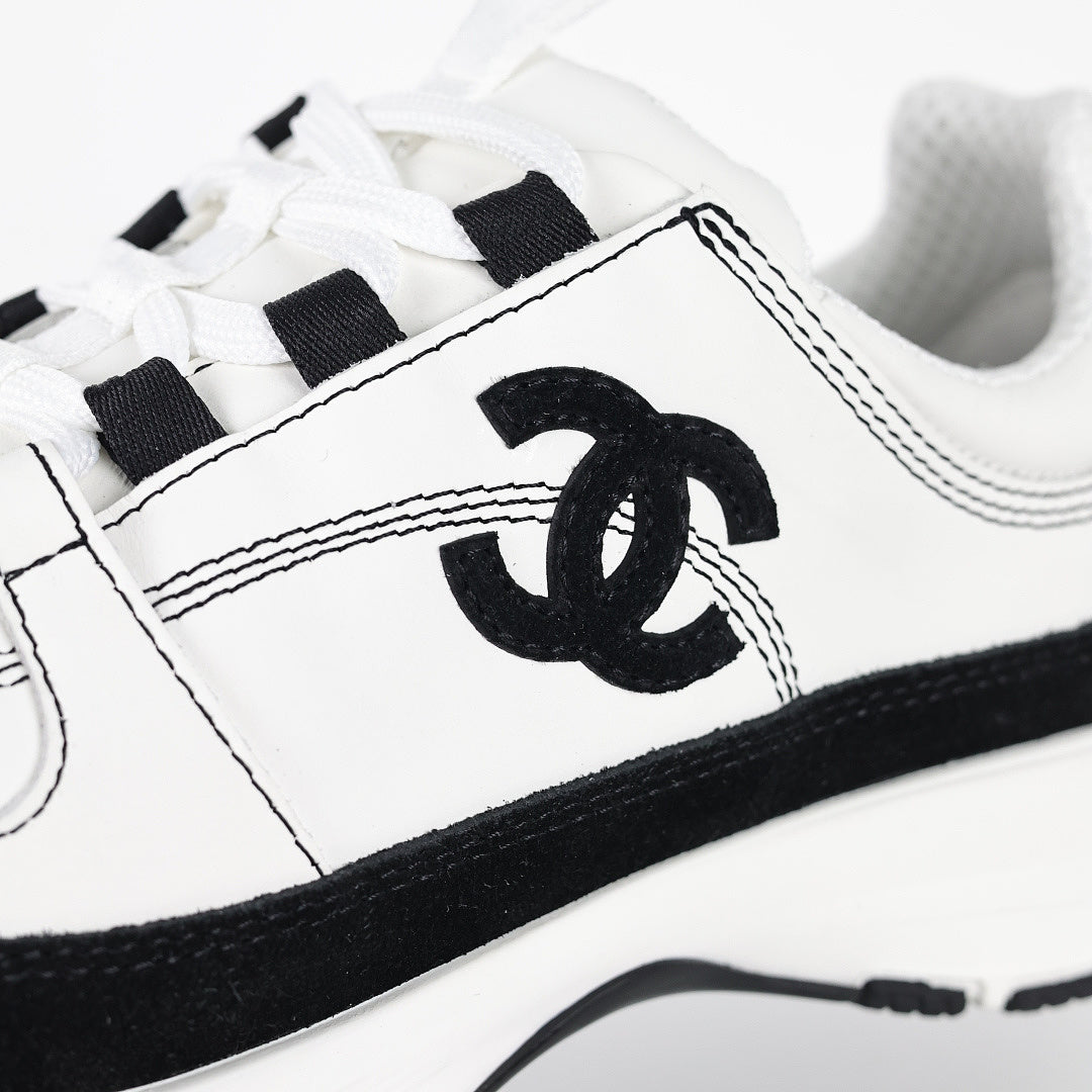 Chanel CC Logo Runner Sneakers – White Leather & Black Suede