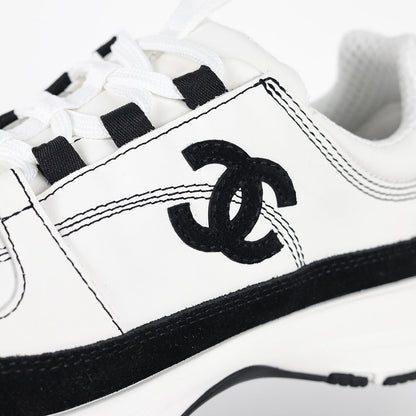 Chanel CC Logo Runner Sneakers – White Leather & Black Suede