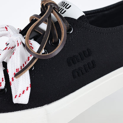 Miu Miu Canvas Low-Top Sneakers in Black