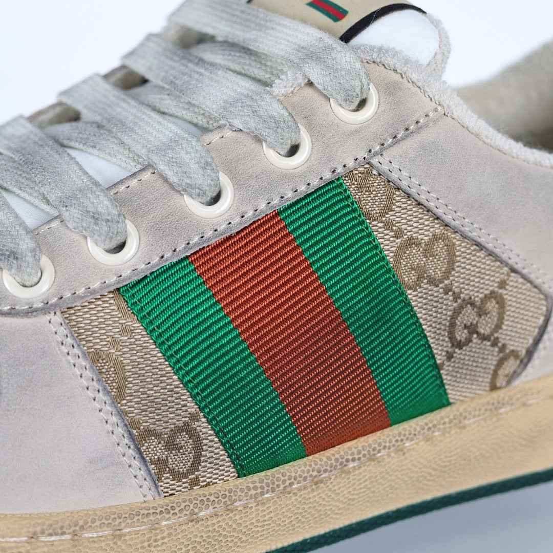 Gucci Screener Low-Top Sneakers – Distressed GG Supreme Canvas with Green Leather Trim