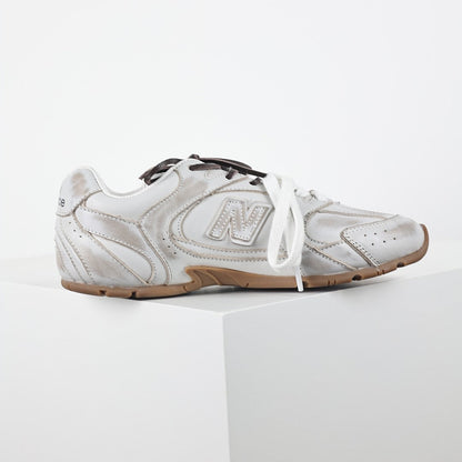 Miu Miu x New Balance 2002R Retro Sneakers in White