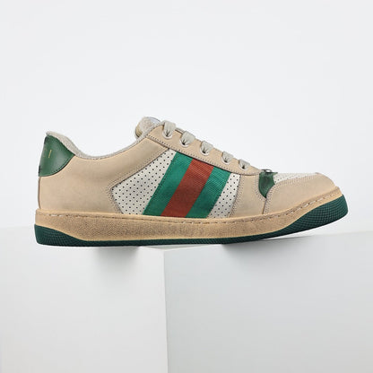 Gucci Screener Low-Top Sneakers – Distressed Leather with Green Trim & Web Stripe