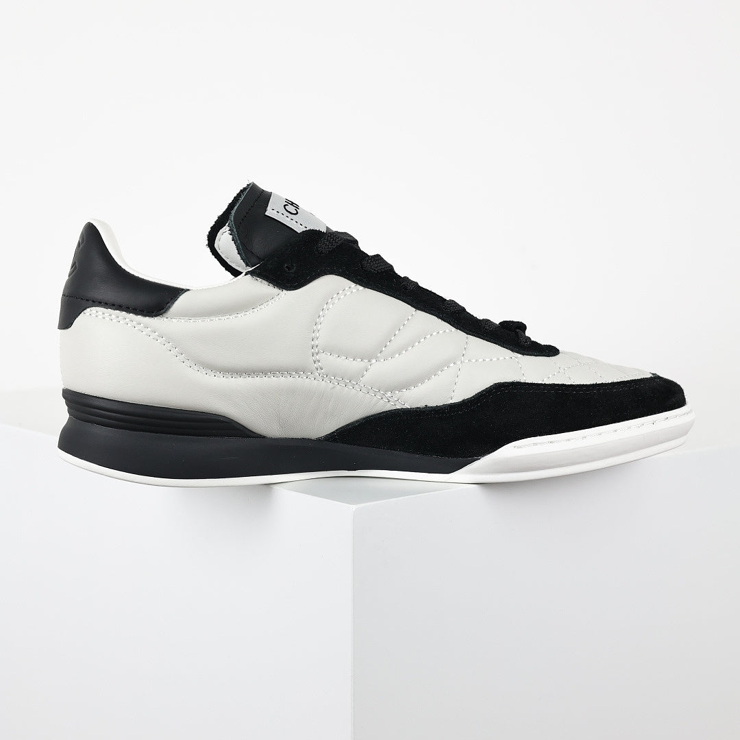 Chanel CC Logo Runner Sneakers – White Quilted Leather & Black Suede