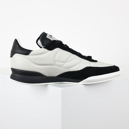 Chanel CC Logo Runner Sneakers – White Quilted Leather & Black Suede