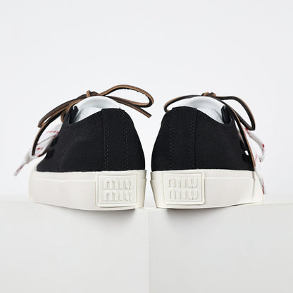 Miu Miu Canvas Low-Top Sneakers in Black
