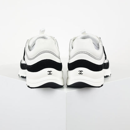 Chanel CC Logo Runner Sneakers – White Leather & Black Suede