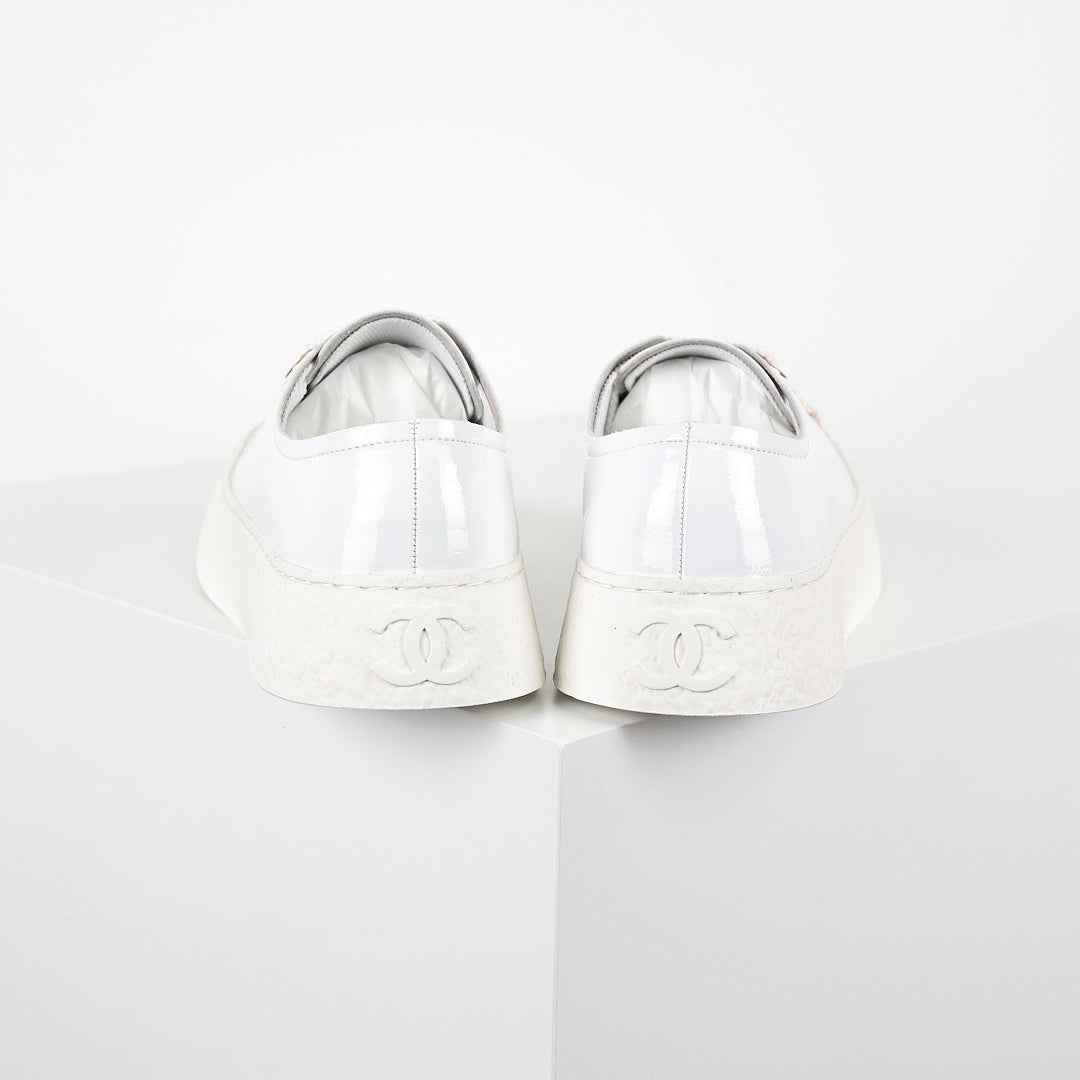 Chanel Low-Top Platform Sneakers – White Leather with Gold CC Lace Charm