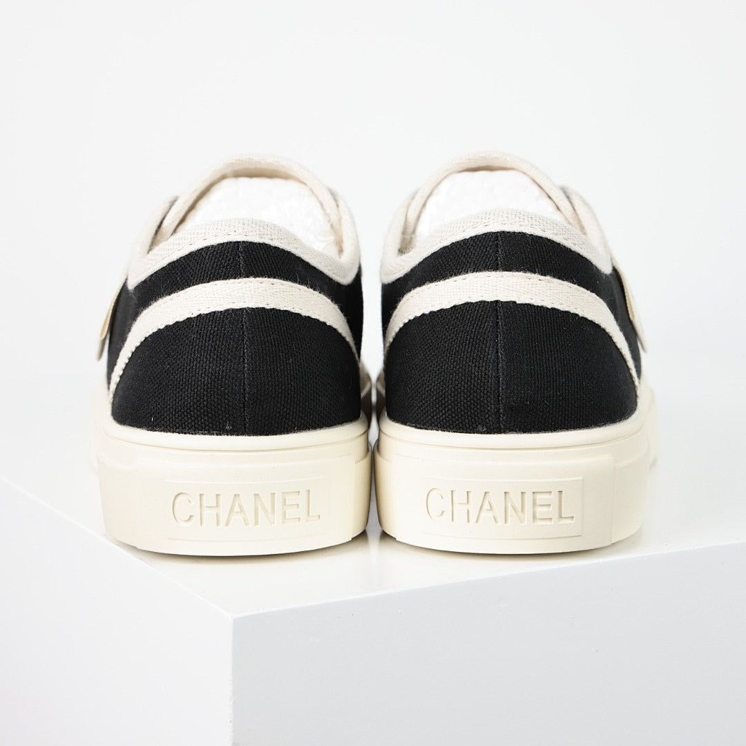 Chanel Limited Edition Low-Top Canvas Sneakers – Black & White with CC Logo Patch