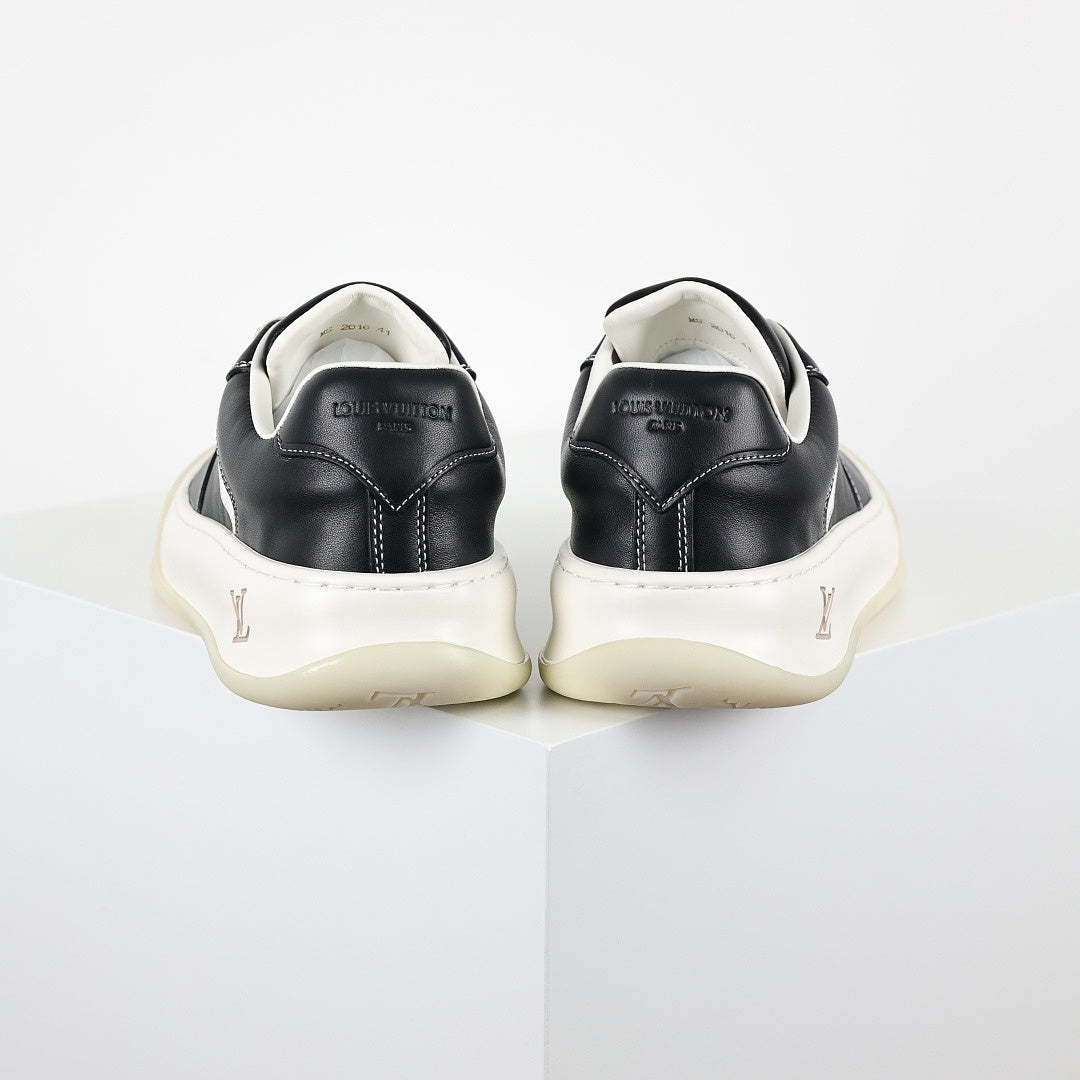 Louis Vuitton Leather Biscuit Sneakers – Black