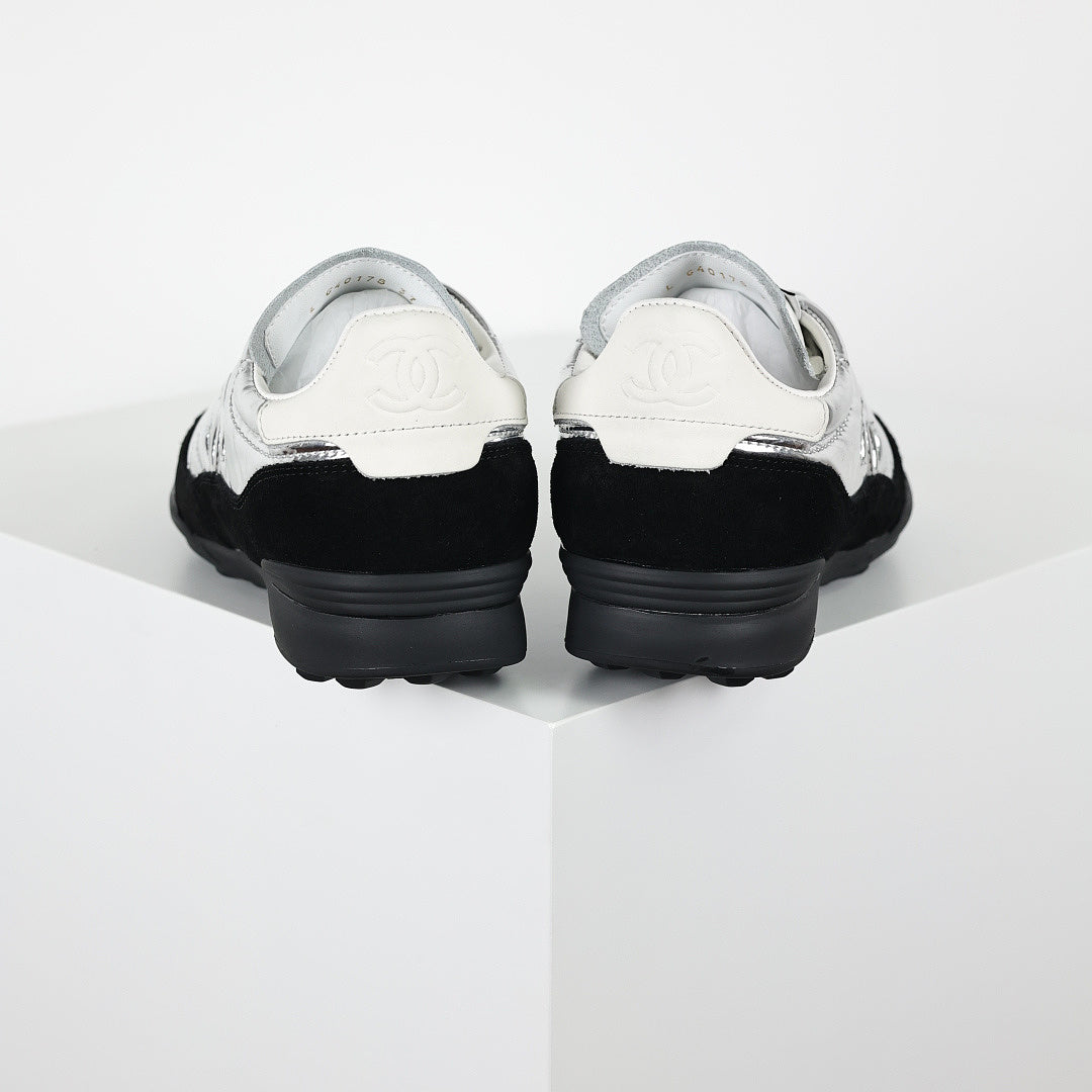 Chanel CC Logo Runner Sneakers – Silver Quilted Metallic Leather & Black Suede