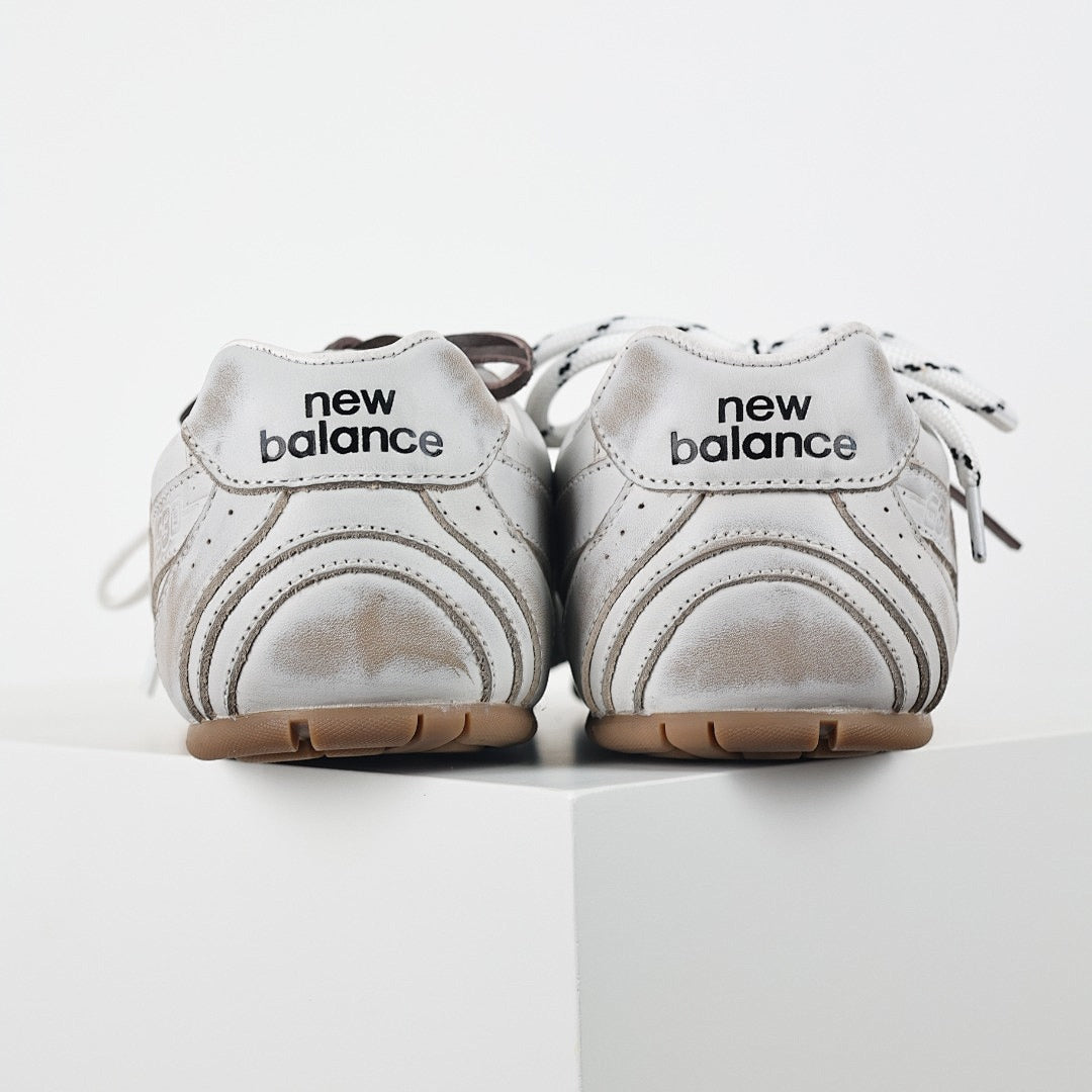 Miu Miu x New Balance 2002R Retro Sneakers in White