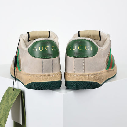 Gucci Screener Low-Top Sneakers – Distressed GG Supreme Canvas with Green Leather Trim