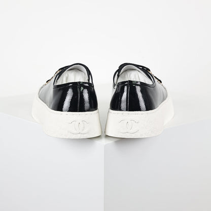 Chanel Low-Top Platform Sneakers – Black Patent Leather with Gold CC Lace Charm