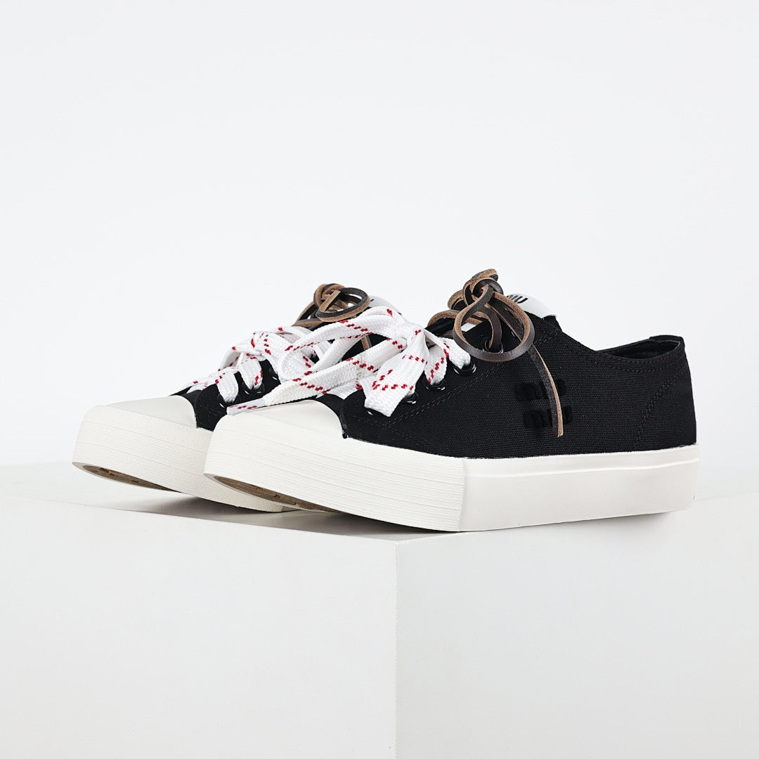 Miu Miu Canvas Low-Top Sneakers in Black
