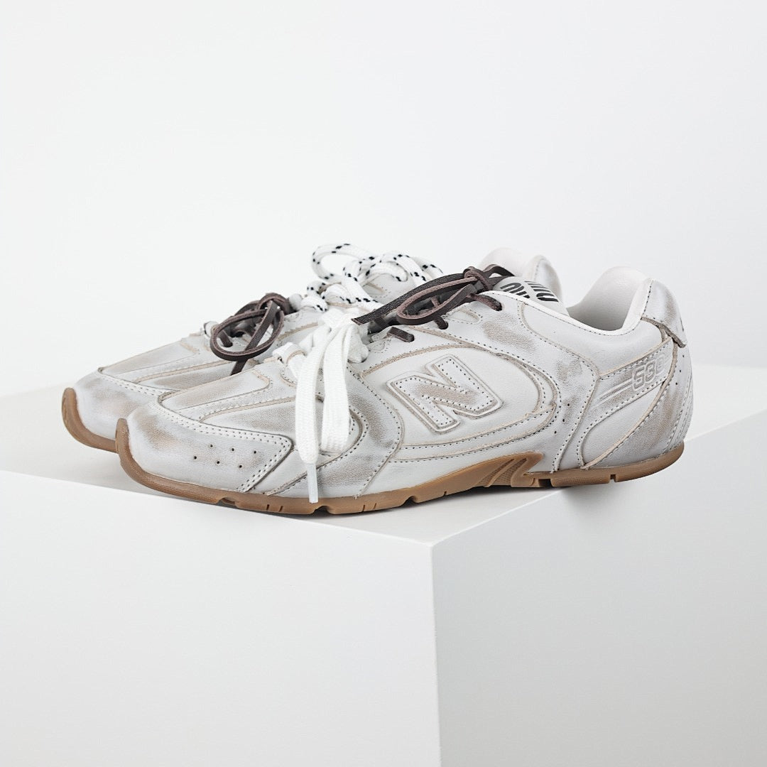 Miu Miu x New Balance 2002R Retro Sneakers in White