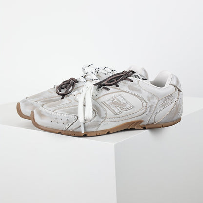 Miu Miu x New Balance 2002R Retro Sneakers in White